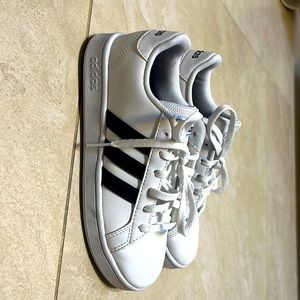 Kids adidas tennis shoes .